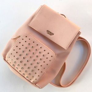 Guess what?! You can save on this iconic GUESS bag